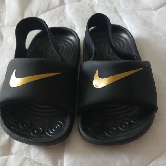 Nike Black and Gold Slide Sandals with Textured Footbed - Picture 1 of 5